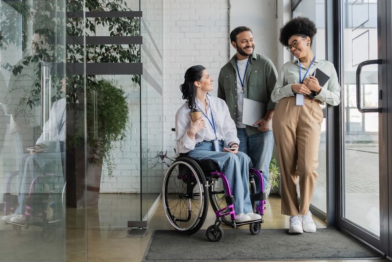 Group,Shot,Of,Diverse,Business,People,,Disabled,Woman,On,Wheelchair