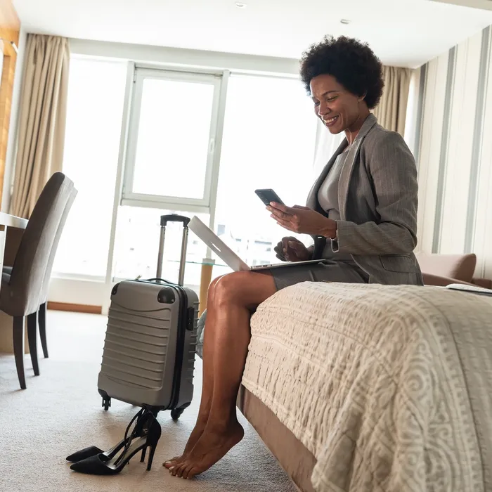 Tired,African-american,Businesswoman,Are,Finally,Arrives,In,The,Hotel,Room