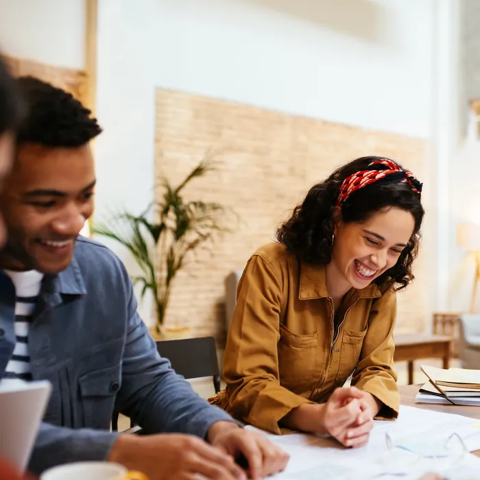 Two people looking at plans