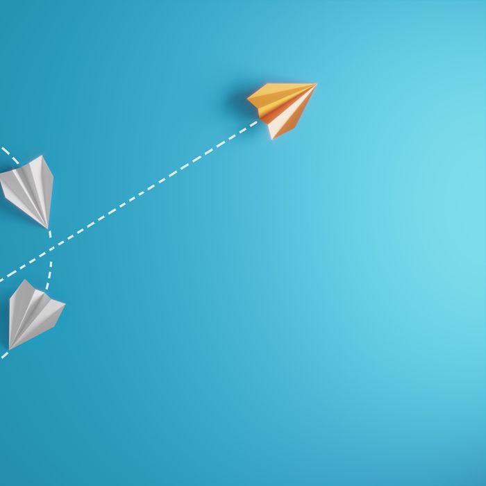 Group of paper airplane in same one direction  and with one individual pointing in the different way, can be used leadership/individuality/innovation concepts.( 3d render )