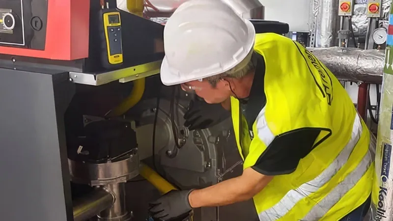 worker is checking an equipment