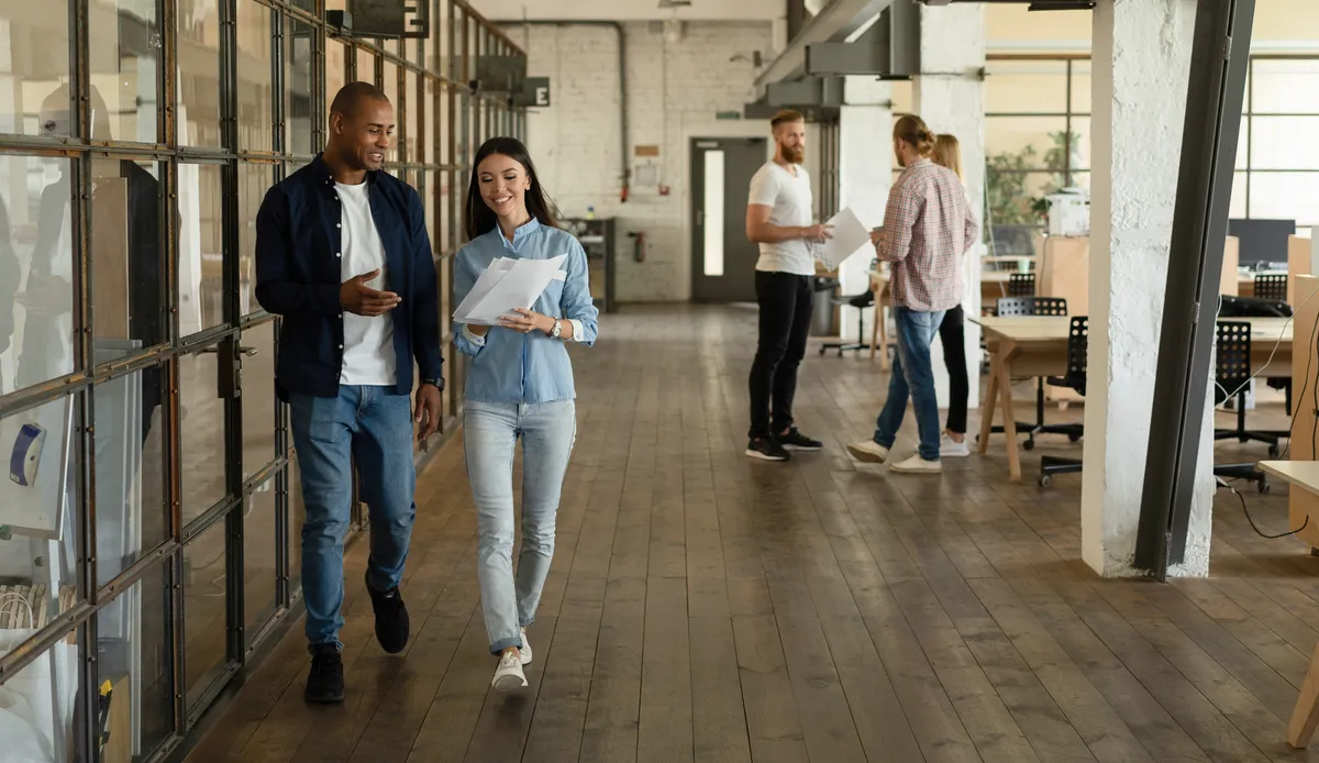 Business,People,At,Work,In,A,Busy,Office,Space