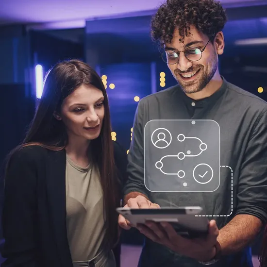 Colleagues looking at a tablet