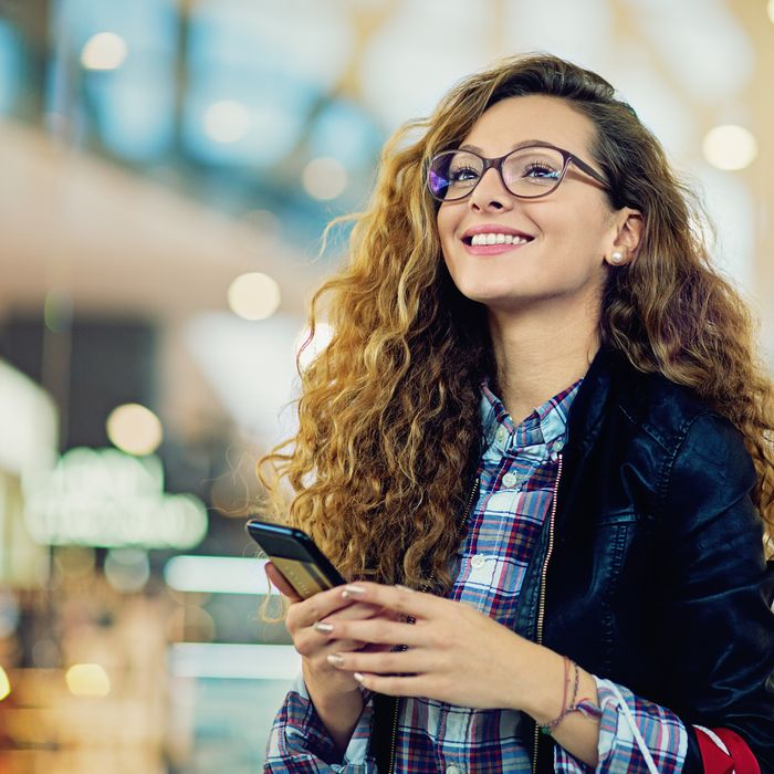 Young beautiful girl is shopping in the Mall