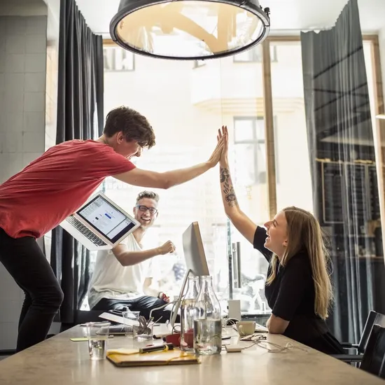 Successful team of new business people in creative office