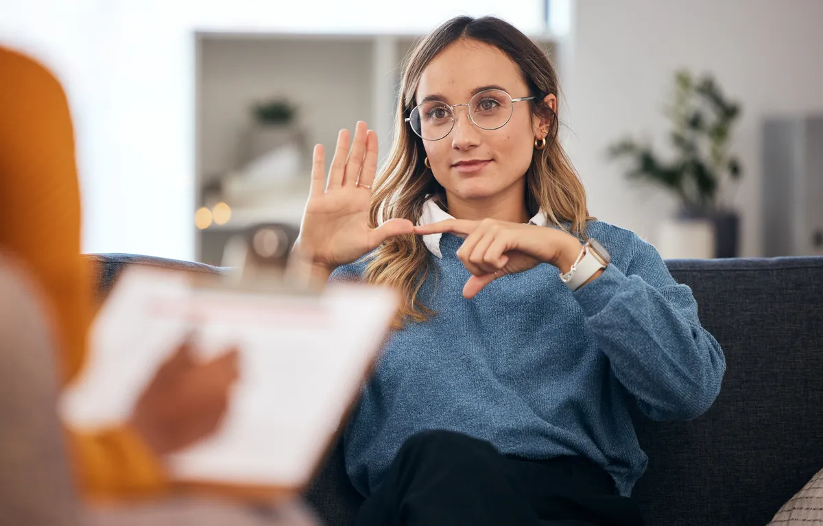 Sign,Language,,Speech,Therapy,And,Woman,Talking,To,Therapist,In