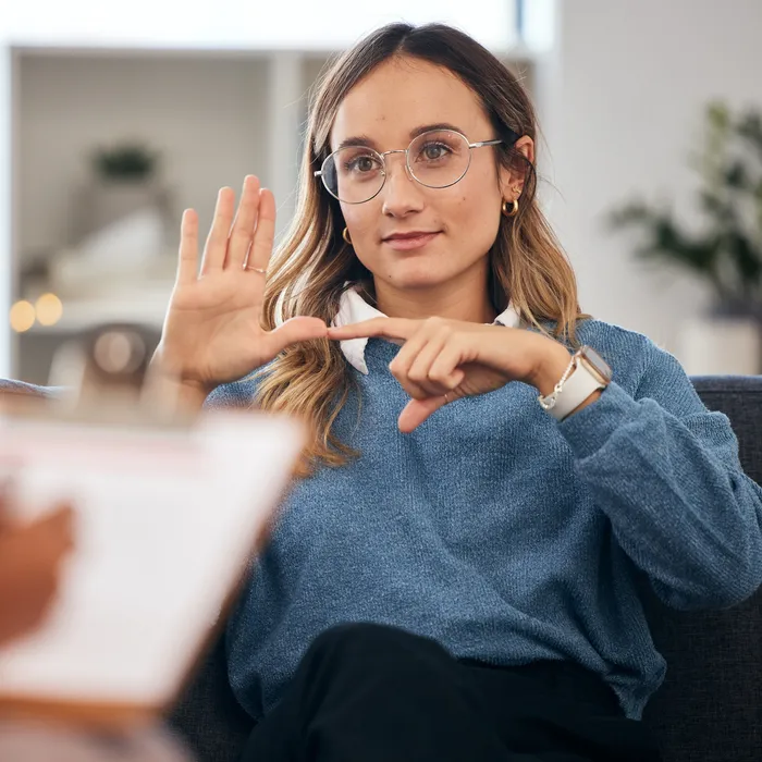 Sign,Language,,Speech,Therapy,And,Woman,Talking,To,Therapist,In