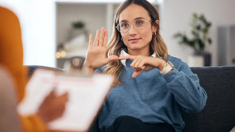 Sign,Language,,Speech,Therapy,And,Woman,Talking,To,Therapist,In