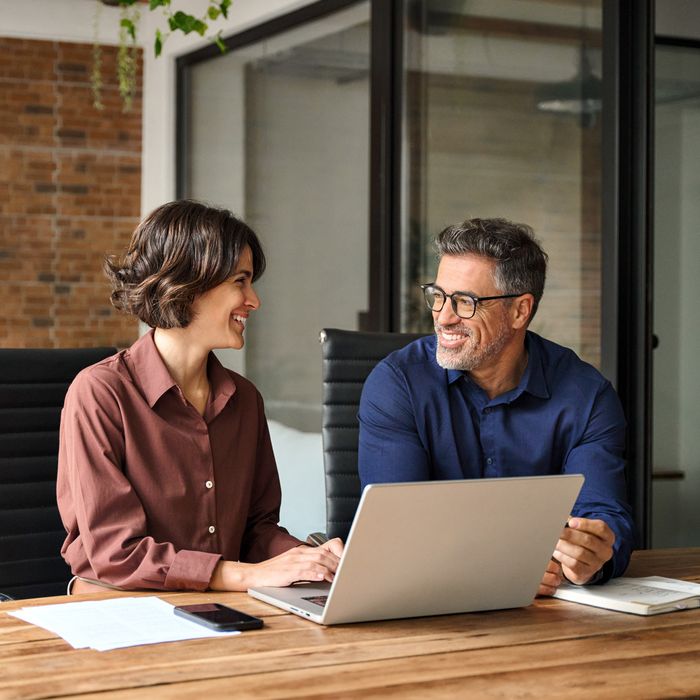 man and woman in the office 