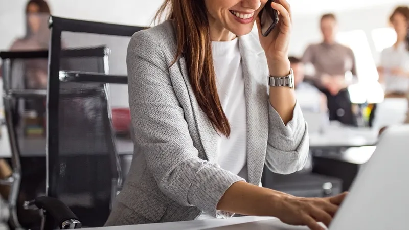 Working at office with a lot of people.