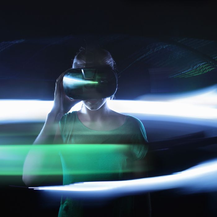 Girl using VR glasses, lights around her