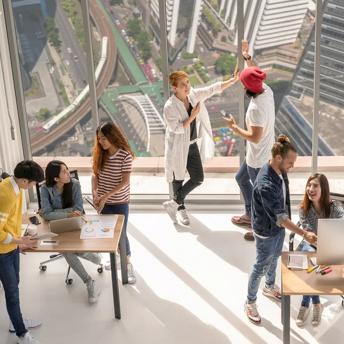 Top view scene Group of asian and Multiethnic Business people with casual suit working and brainstorming each small group in the modern workplace, diversity and teamwork concept