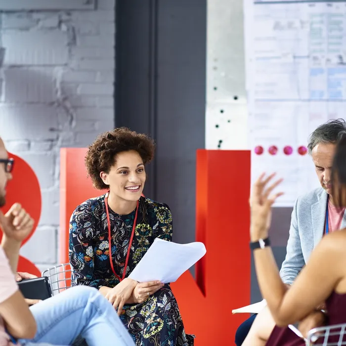 People having meeting in modern officeColorful Human