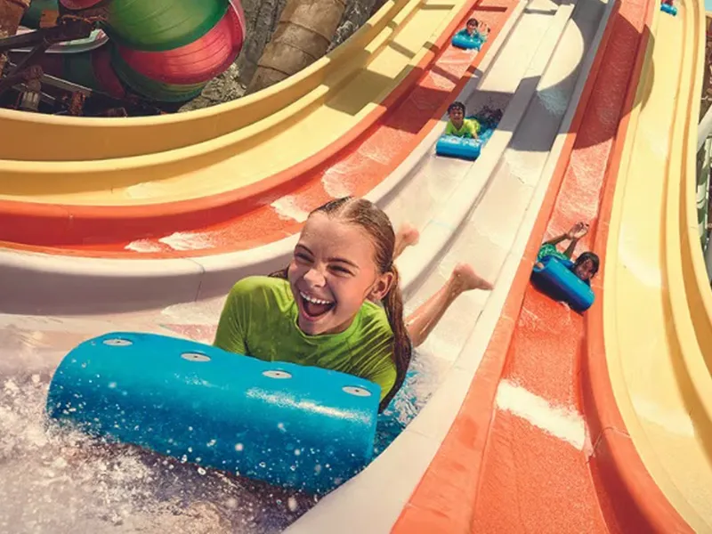 a girl on a water slide