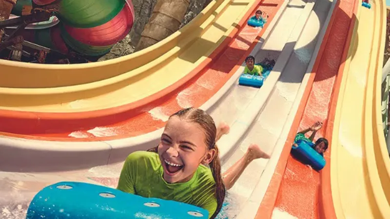 a girl on a water slide