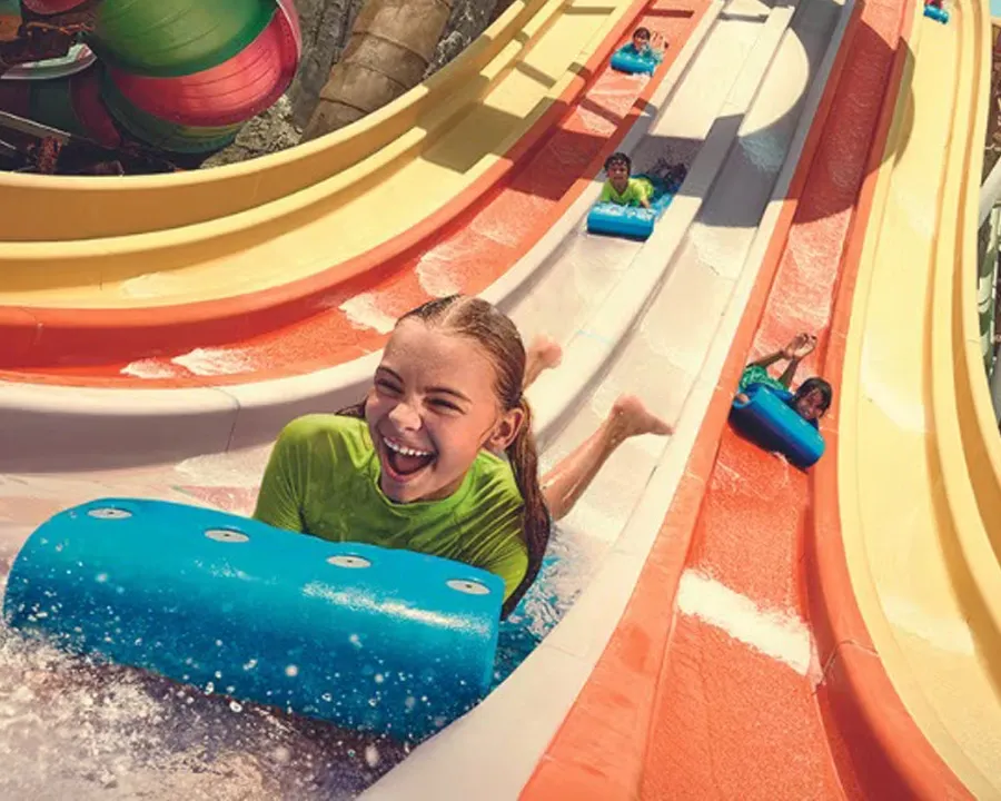 a girl on a water slide