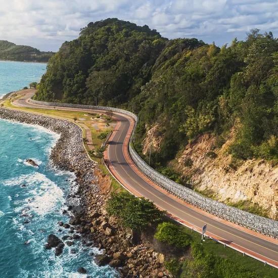Aerial view highway road along the sea.