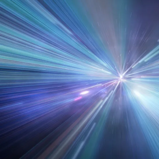 Zoom in high speed light on dark background.