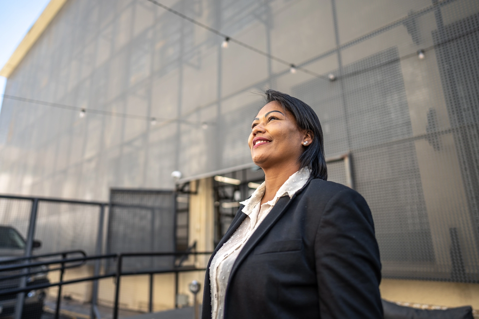 Mature businesswoman contemplating at office