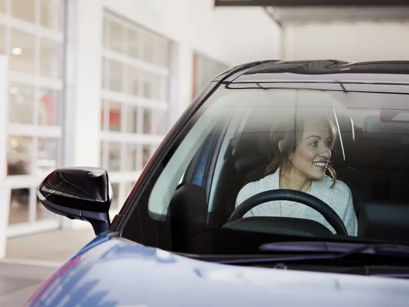 Woman in a Toyota car