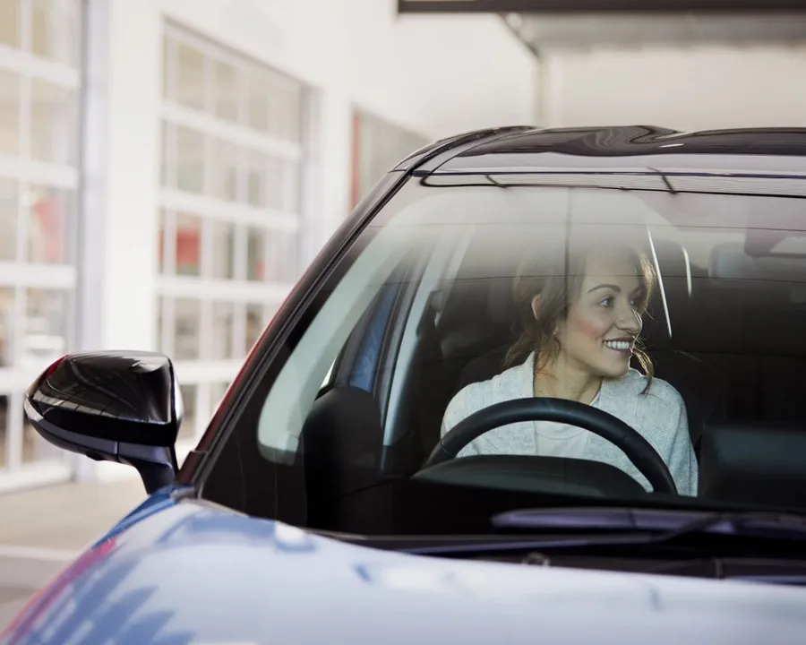 Woman in a Toyota car