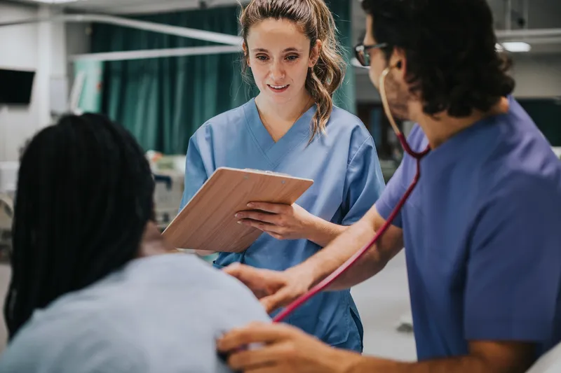 Young,Male,Physician,Examining,A,Patient