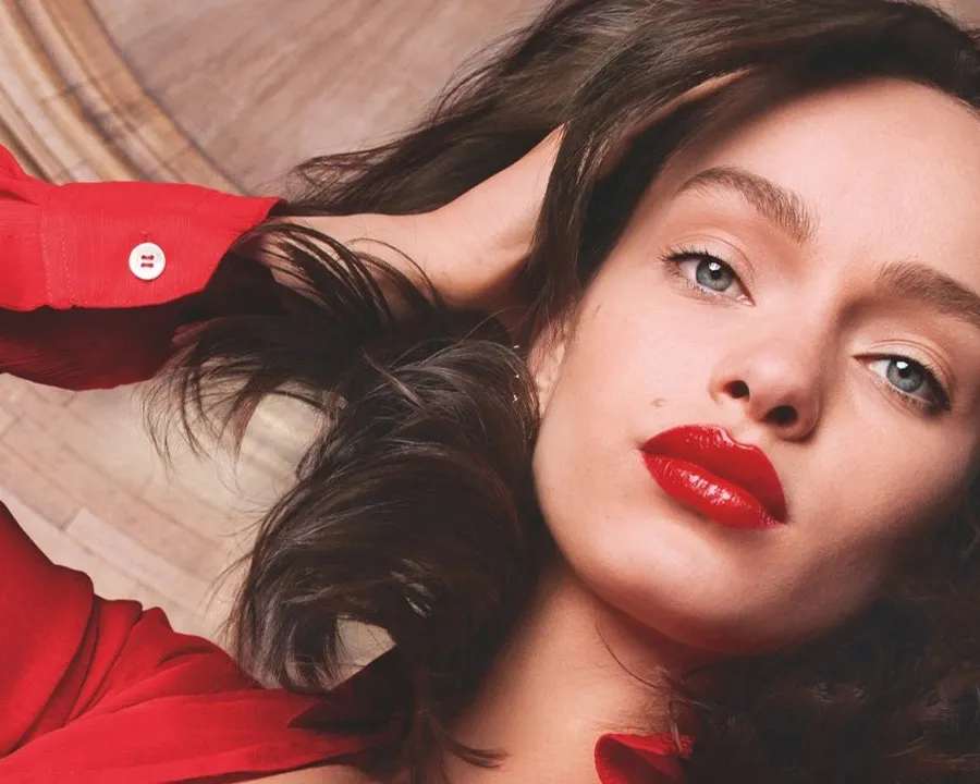 beautiful woman with red lipstick and red outfit
