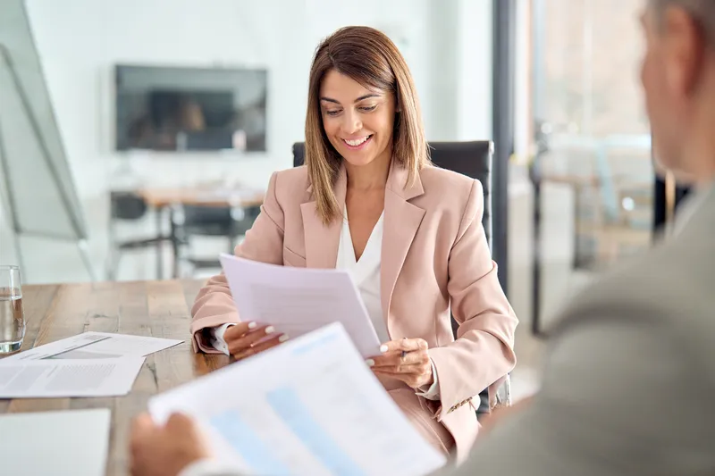 Happy,Middle,Aged,Business,Woman,Account,Manager,Discussing,Documents,Financial